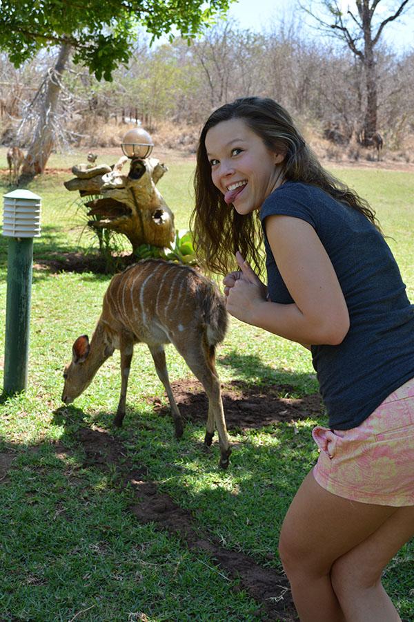 Willis posing in front of a very common Enyala animal, part of the deer family. 