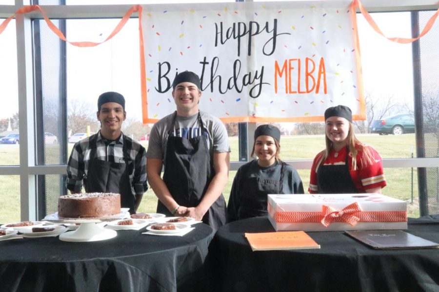 Culinary Arts students baked and served Melbas birthday cake. From left: John Garcia, Brock Duckworth, Jeny Valenzuela Rebecca Sowers. 