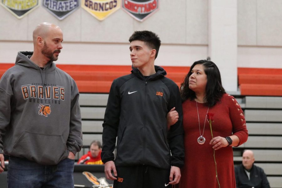 Senior Peyton Richardson and his parents, Ryan and Bobby.