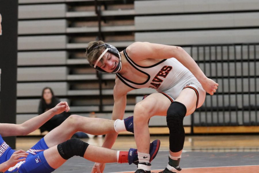 Junior Cassius Vanderpool endures a kick from his SFT opponent.