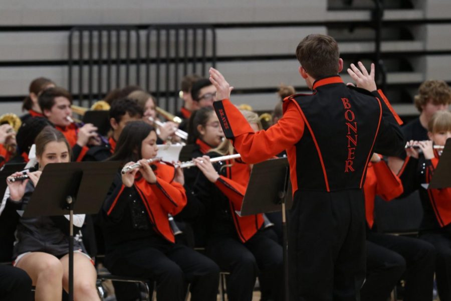 Senior drum major James Wheeler directs the band at Marchapalooza on Nov. 21.