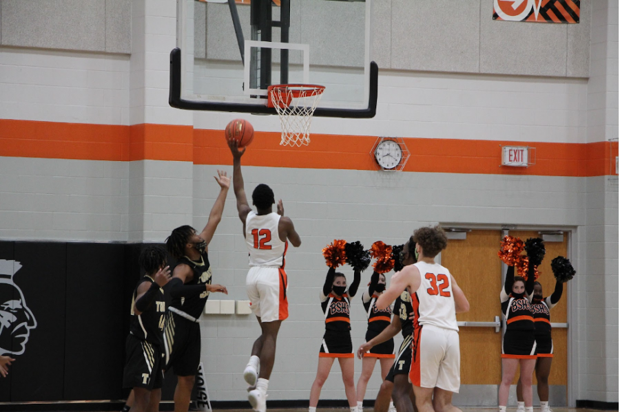 Junior Jayden Young goes for a layup. 
