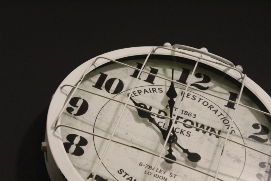 A picture of a clock on a black background