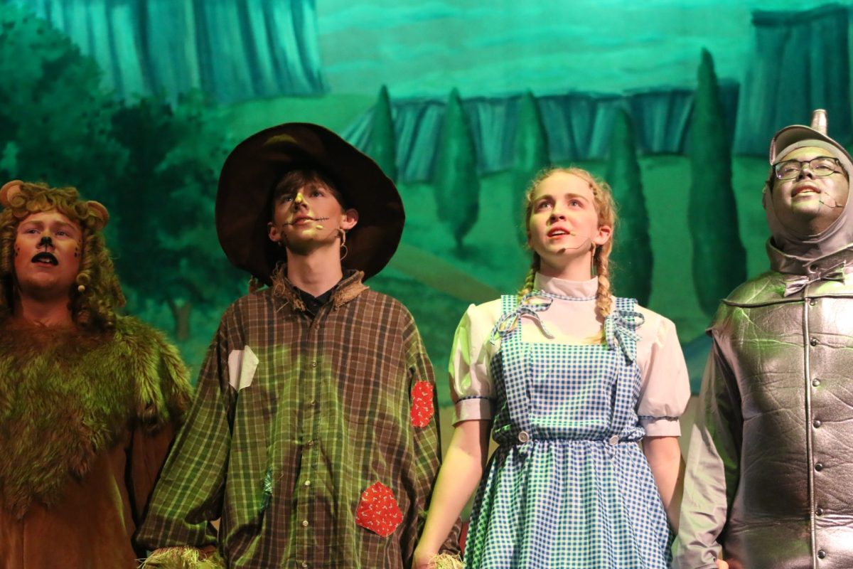 Taylor Morton as Dorthy, Kermitt Jacks as The Tin Man, Blake Taber as The Lion, Micheal Streit as The Scarecrow in BSHS The Wizard of Oz Musical.