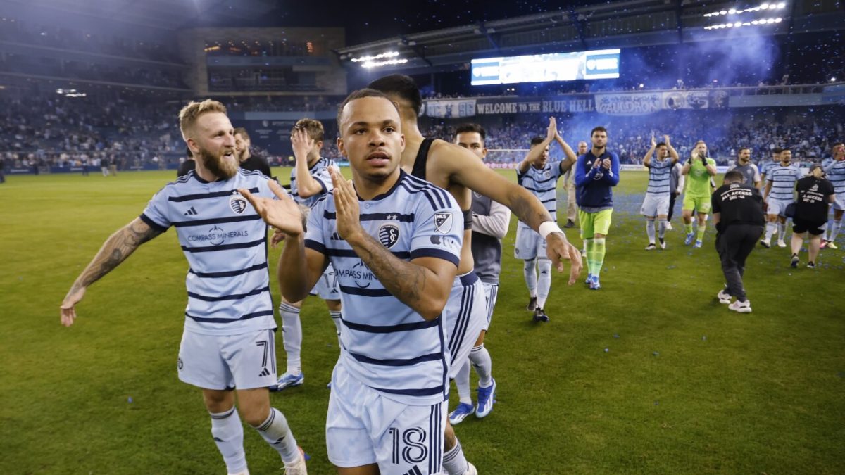 Colin E. Braley/AP
Sporting Kansas City's Johnny Russell (7) and Logan Ndenbe (18) celebrate with teammates at the end of an MLS playoff soccer match against St. Louis City, Sunday, Nov. 5, 2023, in Kansas City, Kan. (AP Photo/Colin E. Braley)