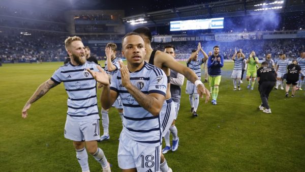 Colin E. Braley/AP
Sporting Kansas Citys Johnny Russell (7) and Logan Ndenbe (18) celebrate with teammates at the end of an MLS playoff soccer match against St. Louis City, Sunday, Nov. 5, 2023, in Kansas City, Kan. (AP Photo/Colin E. Braley)

